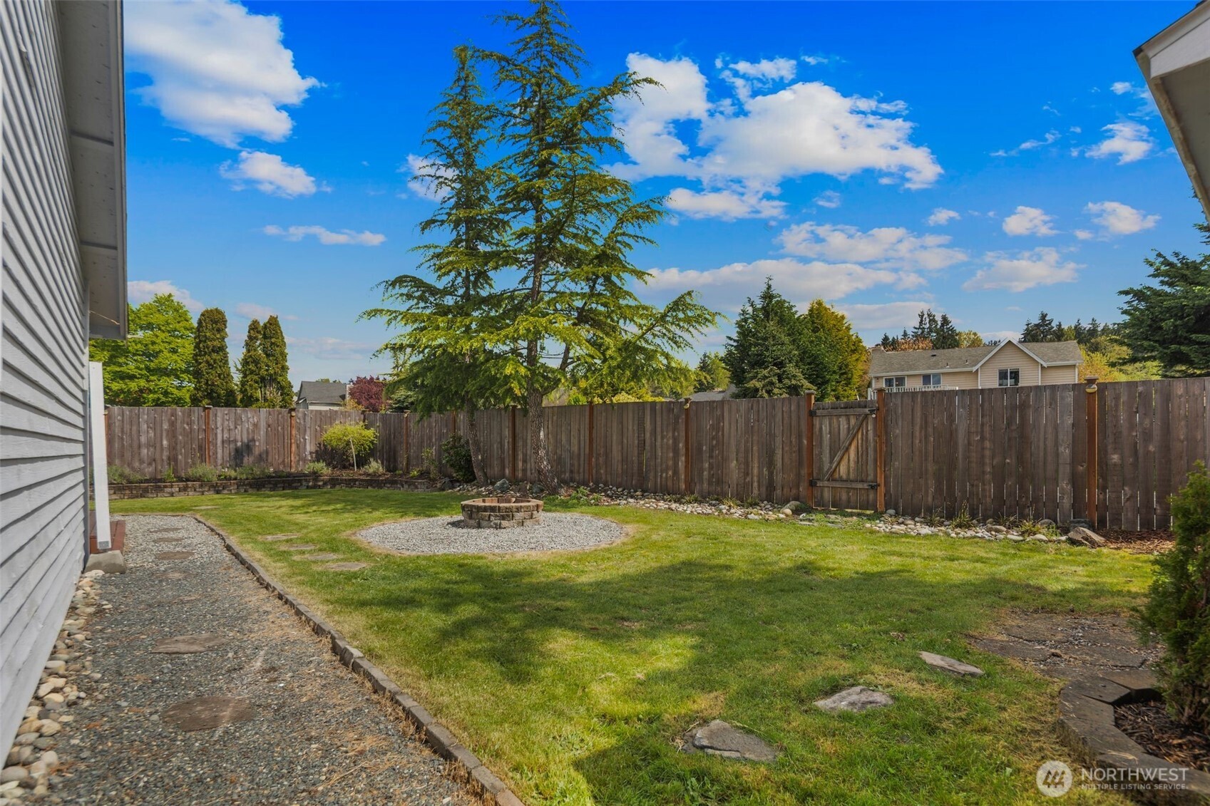 22707 14th Place West Bothell, WA 98021 - Photo 35 of 39 a swimming pool with wooden fence