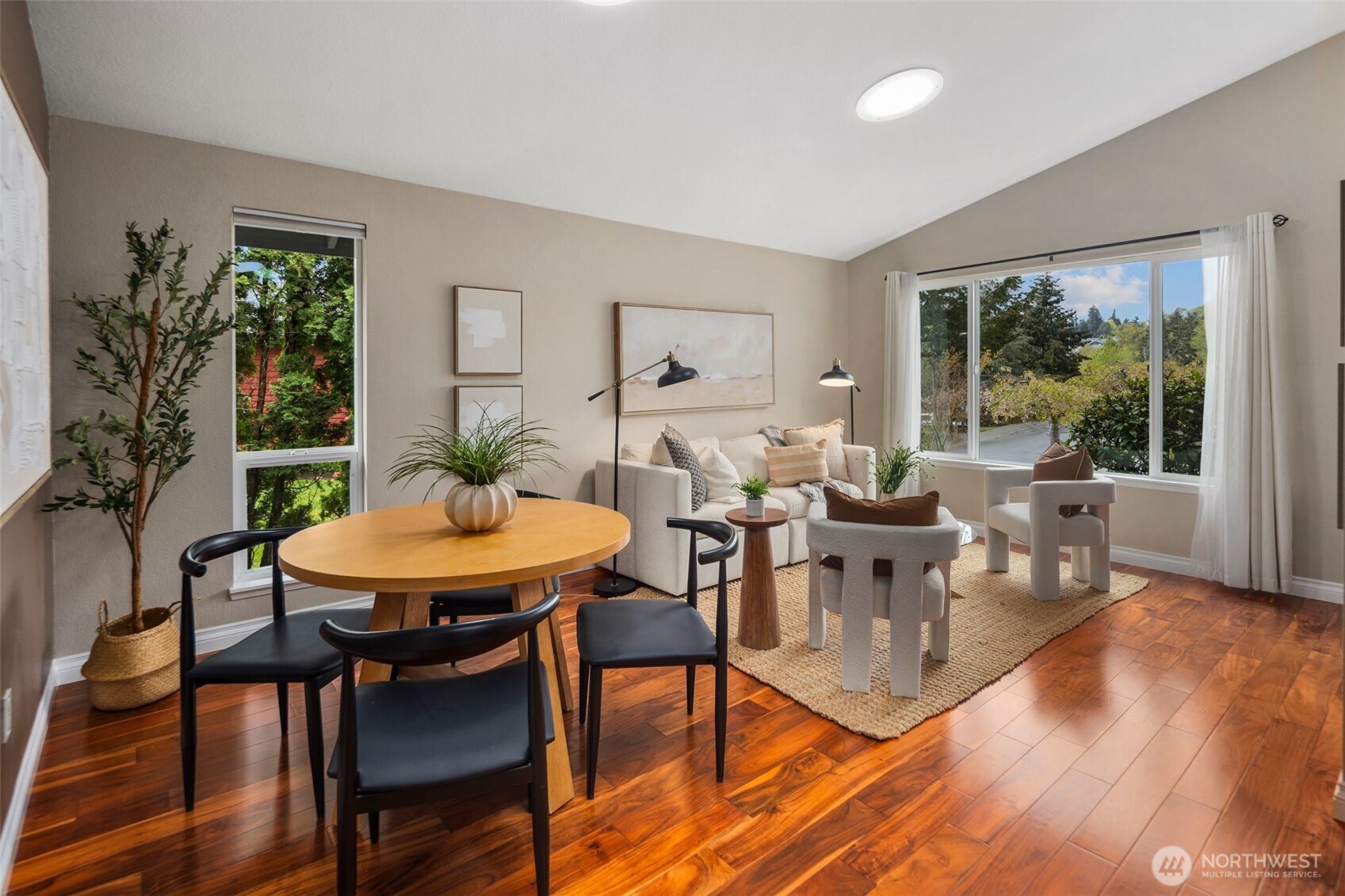 22707 14th Place West Bothell, WA 98021 - Photo 9 of 39 a view of a dining room with furniture window and wooden floor