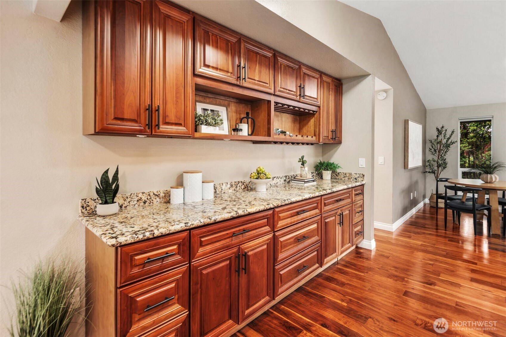 22707 14th Place West Bothell, WA 98021 - Photo 10 of 39 a kitchen with stainless steel appliances granite countertop a sink a stove and cabinets