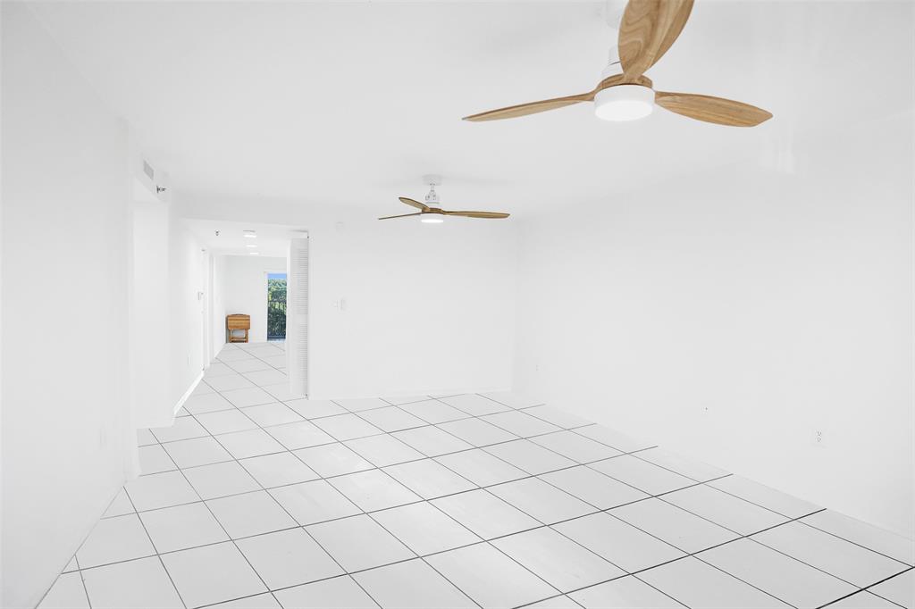 9470 Tangerine Place, Unit 404 Davie, FL 33324 - Photo 2 of 39 a view of a closet and white wall