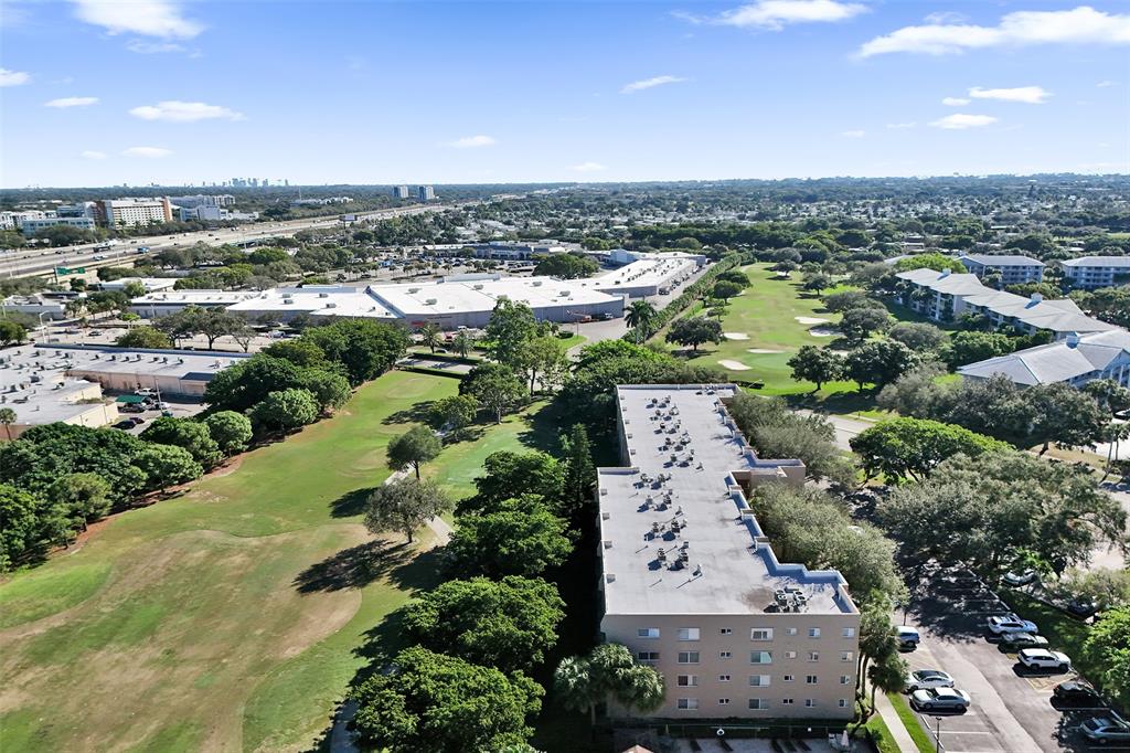 9470 Tangerine Place, Unit 404 Davie, FL 33324 - Photo 24 of 39 an aerial view of a city
