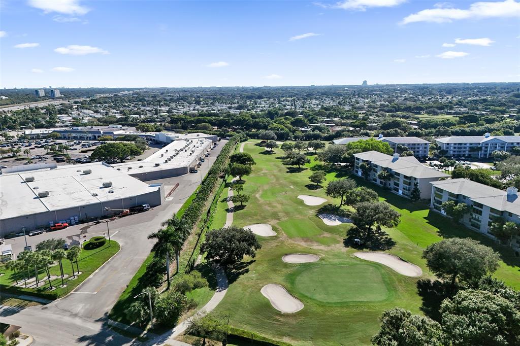 9470 Tangerine Place, Unit 404 Davie, FL 33324 - Photo 28 of 39 an aerial view of a house with a yard and lake view