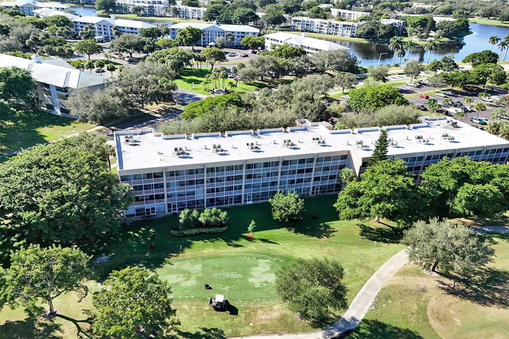 9470 Tangerine Place, Unit 404 Davie, FL 33324 - Photo 33 of 39 a view of a garden with plants
