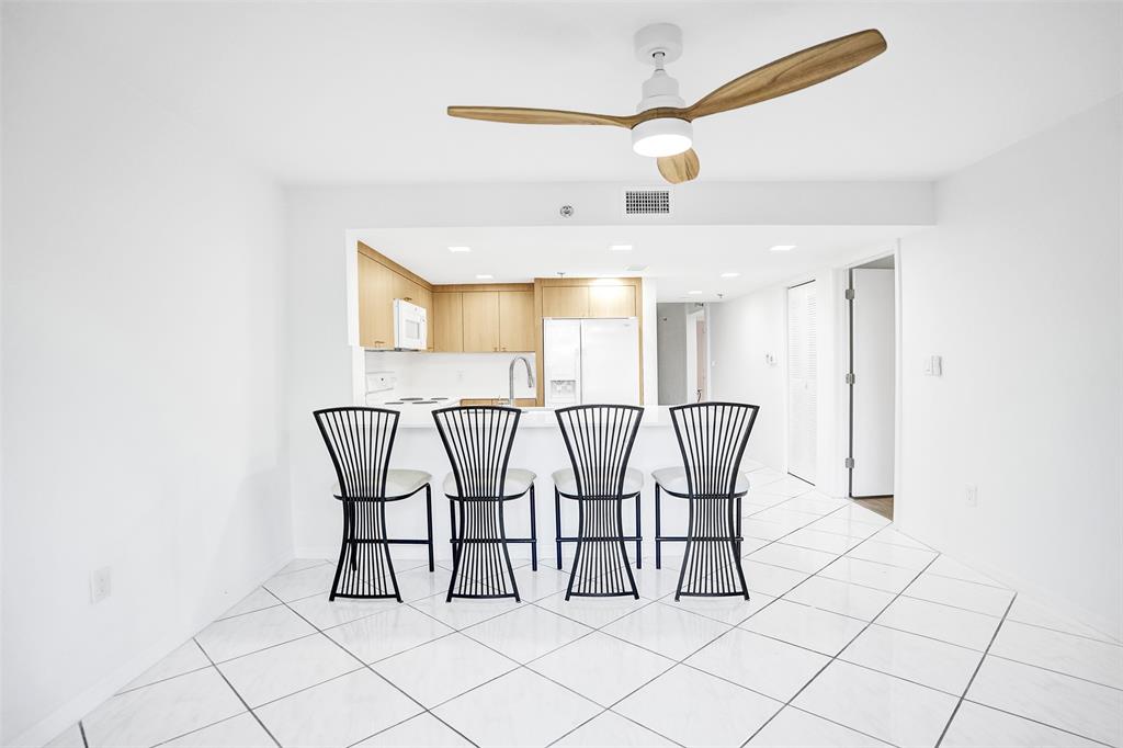 9470 Tangerine Place, Unit 404 Davie, FL 33324 - Photo 7 of 39 a view of a room with gym equipment