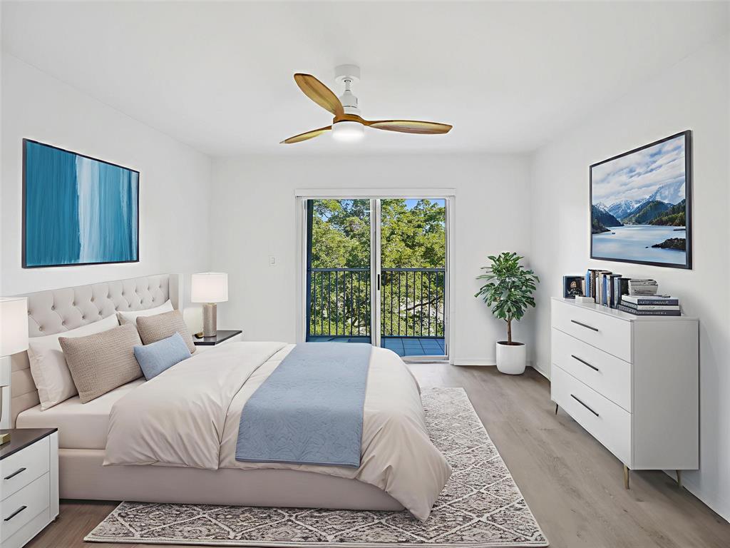 9470 Tangerine Place, Unit 404 Davie, FL 33324 - Photo 9 of 39 a spacious bedroom with a large bed and a window