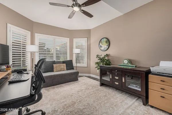 a living room with furniture and a window