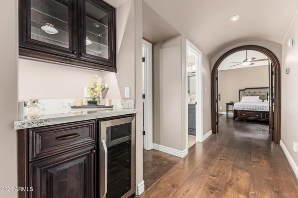 a en suite bathroom with a sink and a mirror