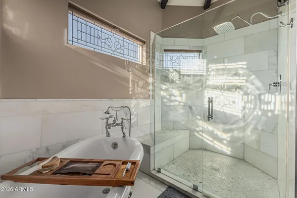 a bathroom with a sink and a shower