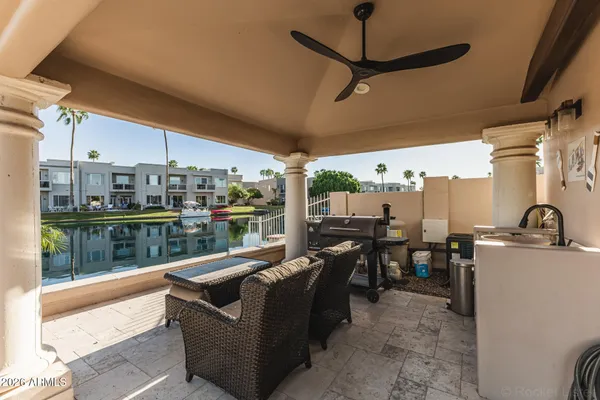 a view of a swimming pool with a seating space