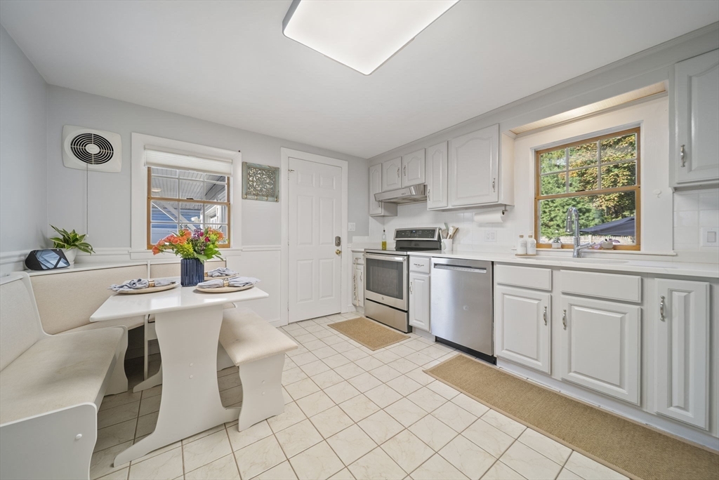 33 Ritchie Road Lynn, MA 01904 - Photo 11 of 39 a kitchen with a sink cabinets and window
