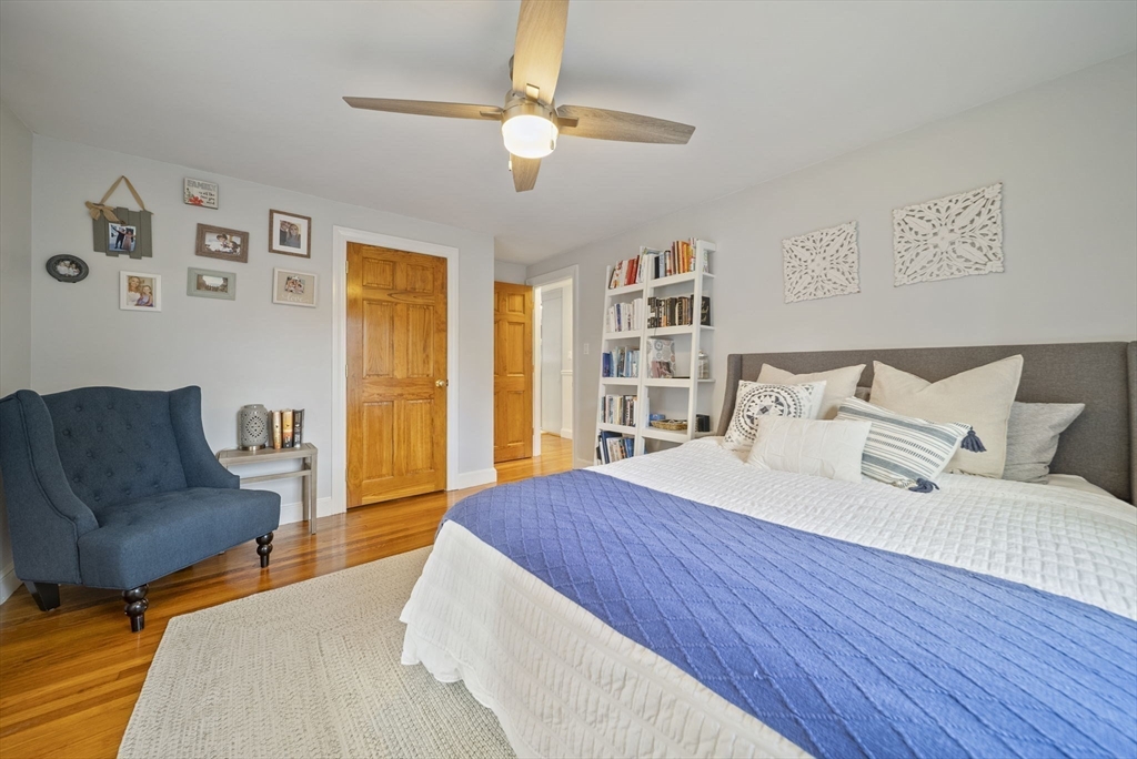 33 Ritchie Road Lynn, MA 01904 - Photo 15 of 39 a bedroom with a large bed and a couch