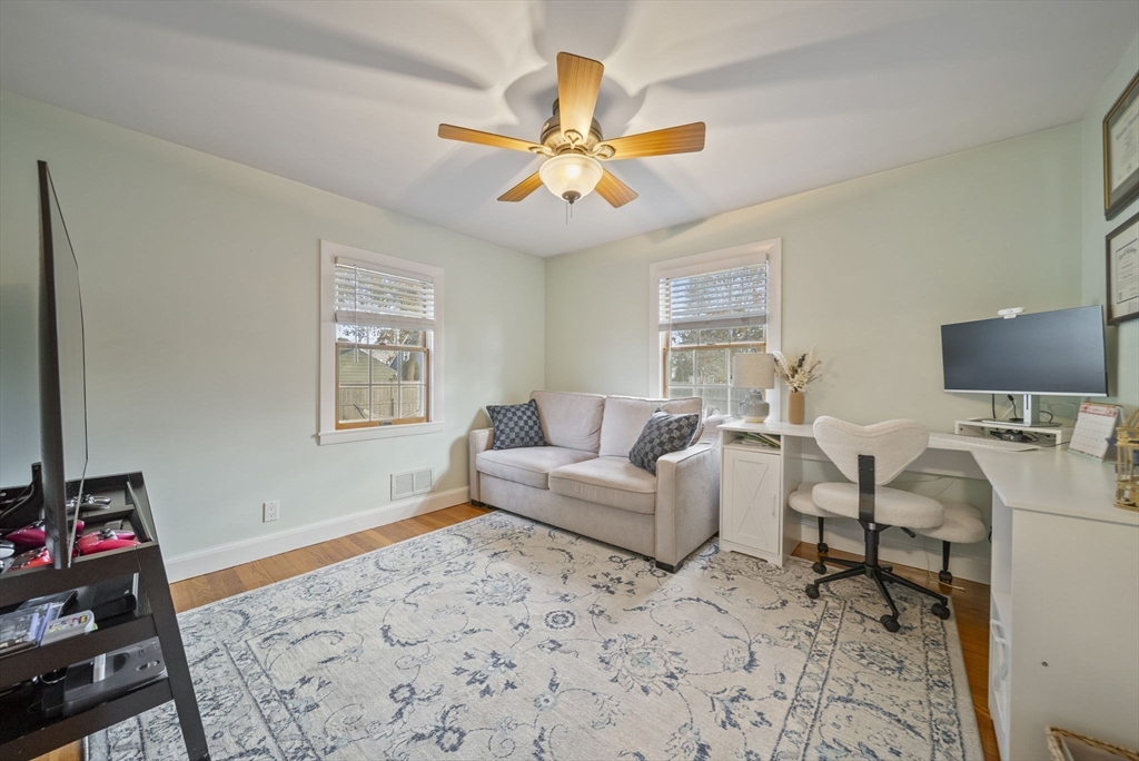 33 Ritchie Road Lynn, MA 01904 - Photo 17 of 39 a living room with furniture and a flat screen tv