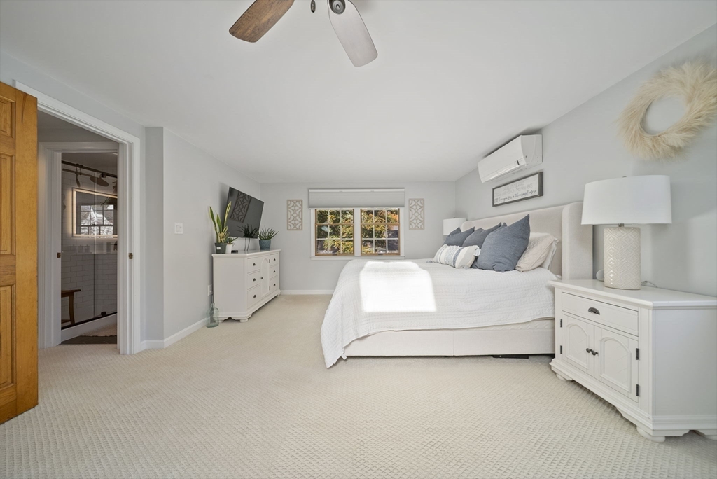 33 Ritchie Road Lynn, MA 01904 - Photo 20 of 39 a bedroom with a white bed and dresser