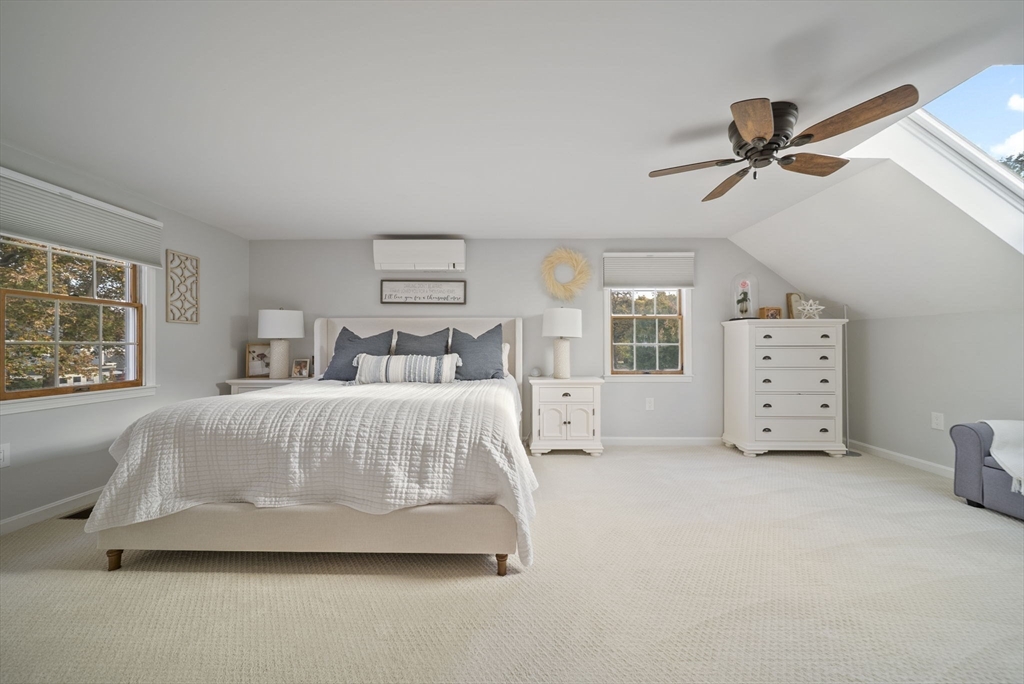 33 Ritchie Road Lynn, MA 01904 - Photo 21 of 39 a spacious bedroom with a bed and a window