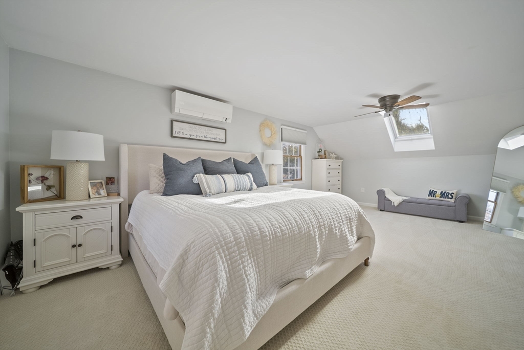 33 Ritchie Road Lynn, MA 01904 - Photo 22 of 39 a spacious bedroom with a bed and a window