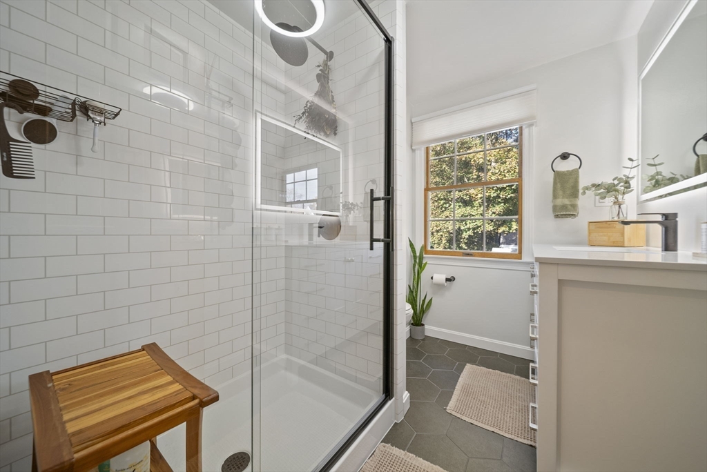 33 Ritchie Road Lynn, MA 01904 - Photo 24 of 39 a bathroom with a tub sink and shower