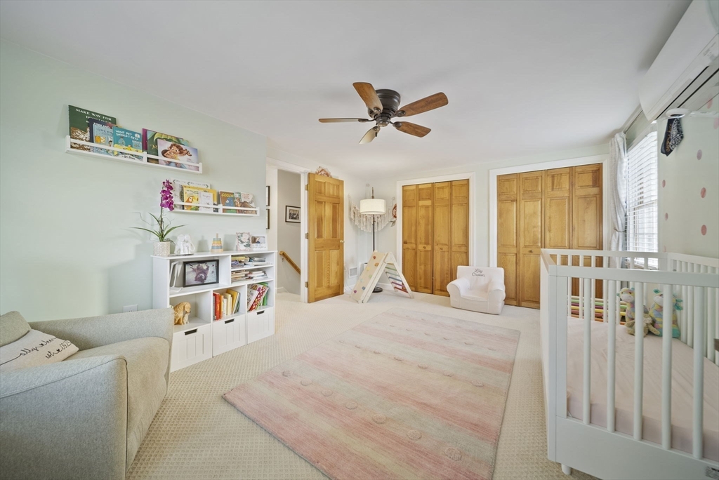 33 Ritchie Road Lynn, MA 01904 - Photo 27 of 39 a bedroom with a bed dresser and a window