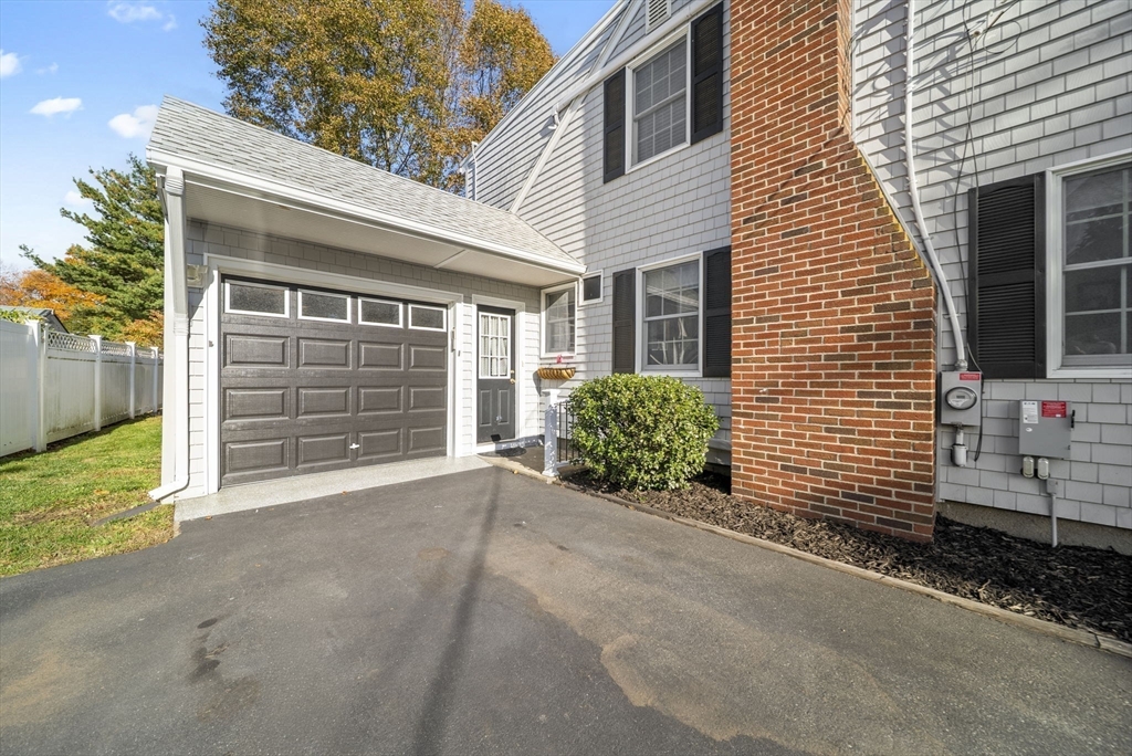 33 Ritchie Road Lynn, MA 01904 - Photo 28 of 39 a view of a house with a garage