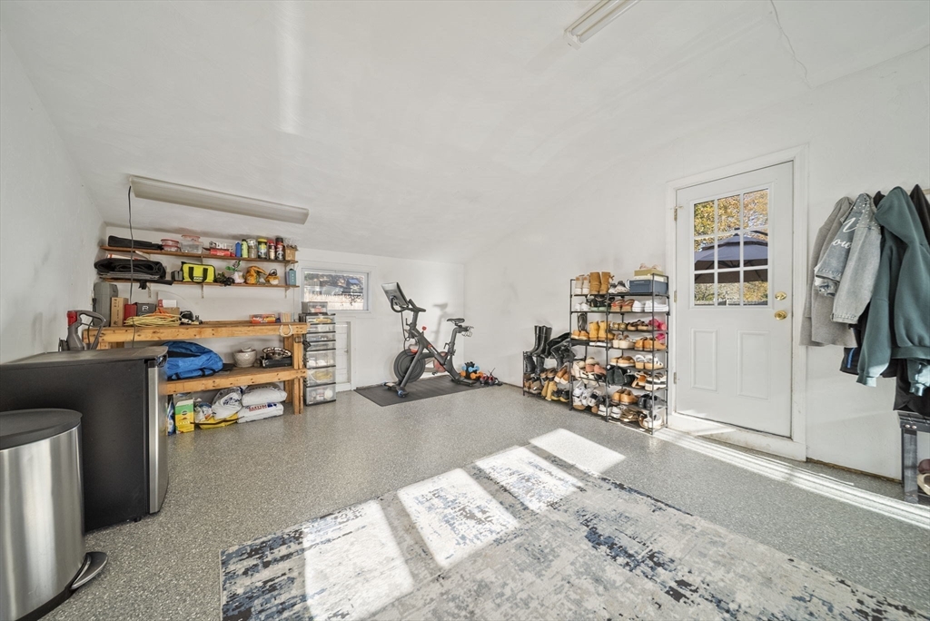 33 Ritchie Road Lynn, MA 01904 - Photo 30 of 39 a bed room with a bed and a couch