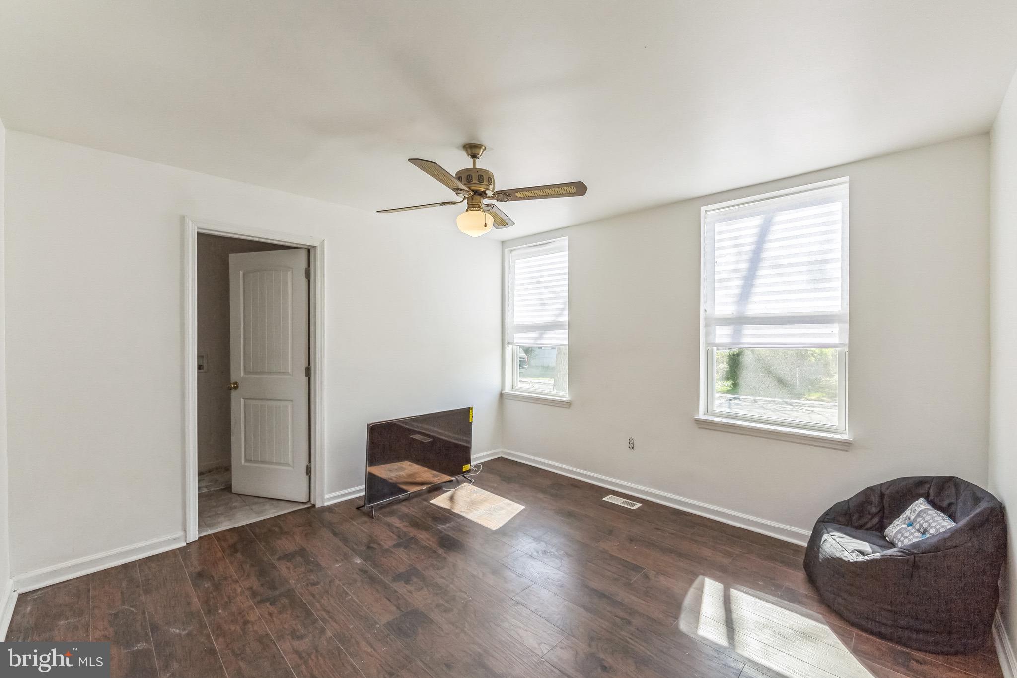 112 Norris Street Mantua, NJ 08051 - Photo 13 of 25 a view of a livingroom with workspace and a window