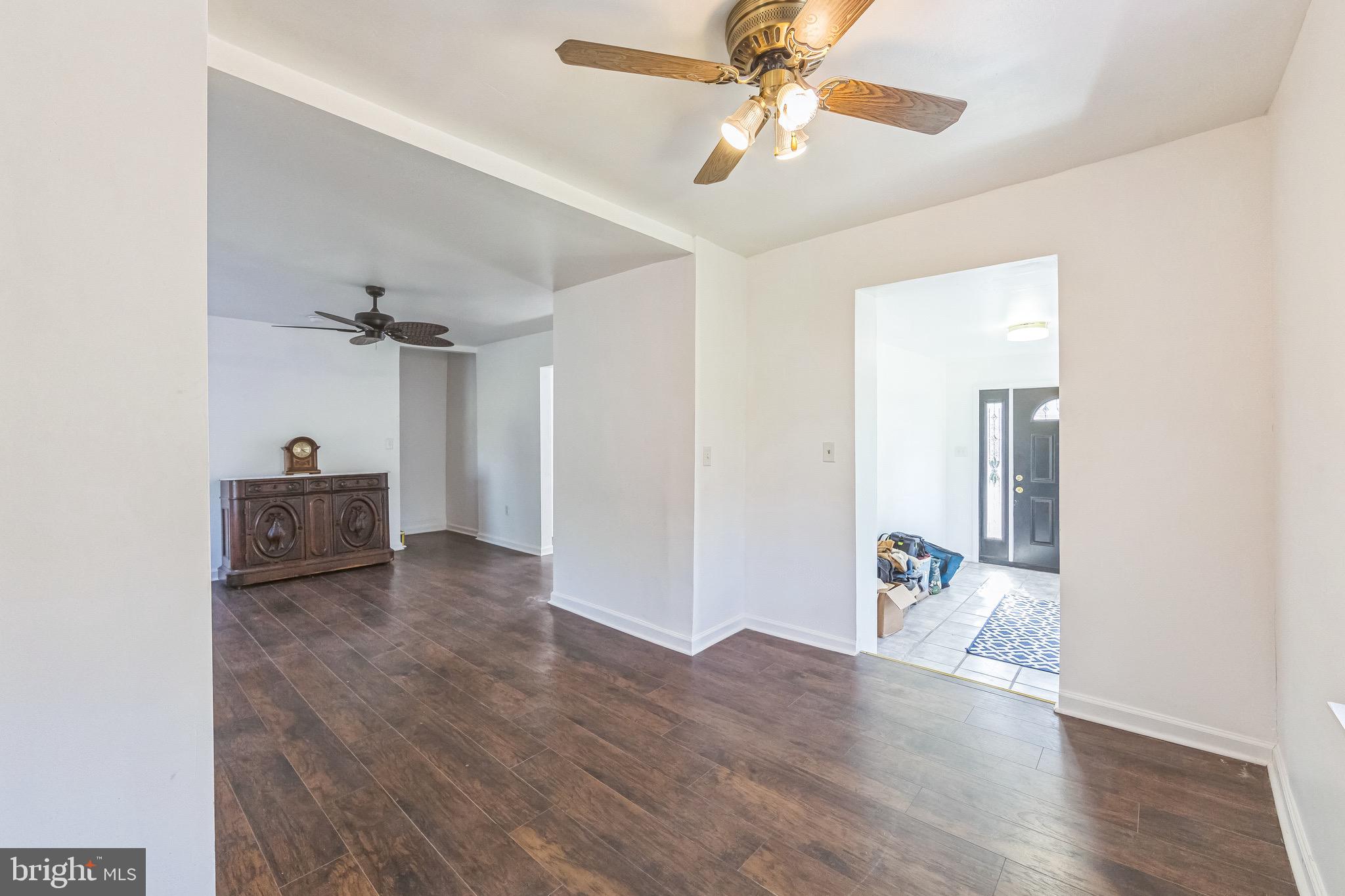 112 Norris Street Mantua, NJ 08051 - Photo 5 of 25 wooden floor in an empty room