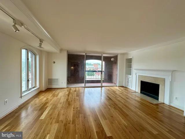 a utility room with a sink and cabinets