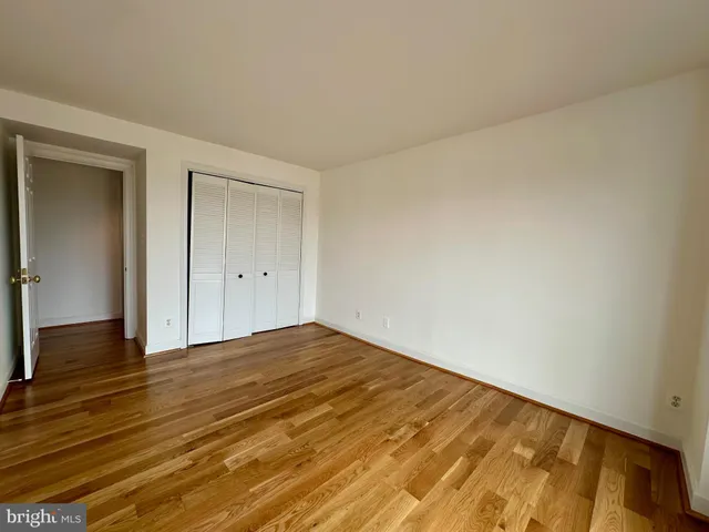a bathroom with a shower and a mirror