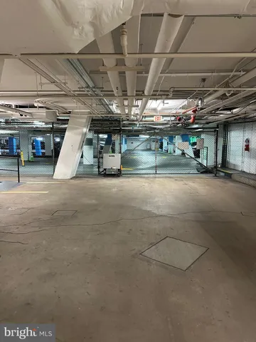a view of swimming pool with a lounge chair