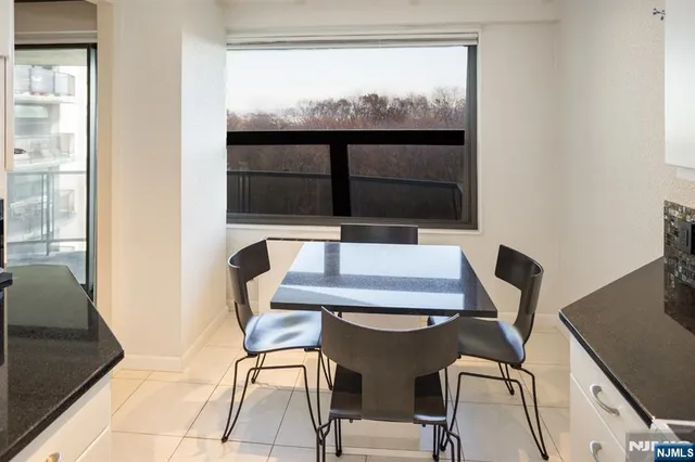 a view of a workspace with furniture