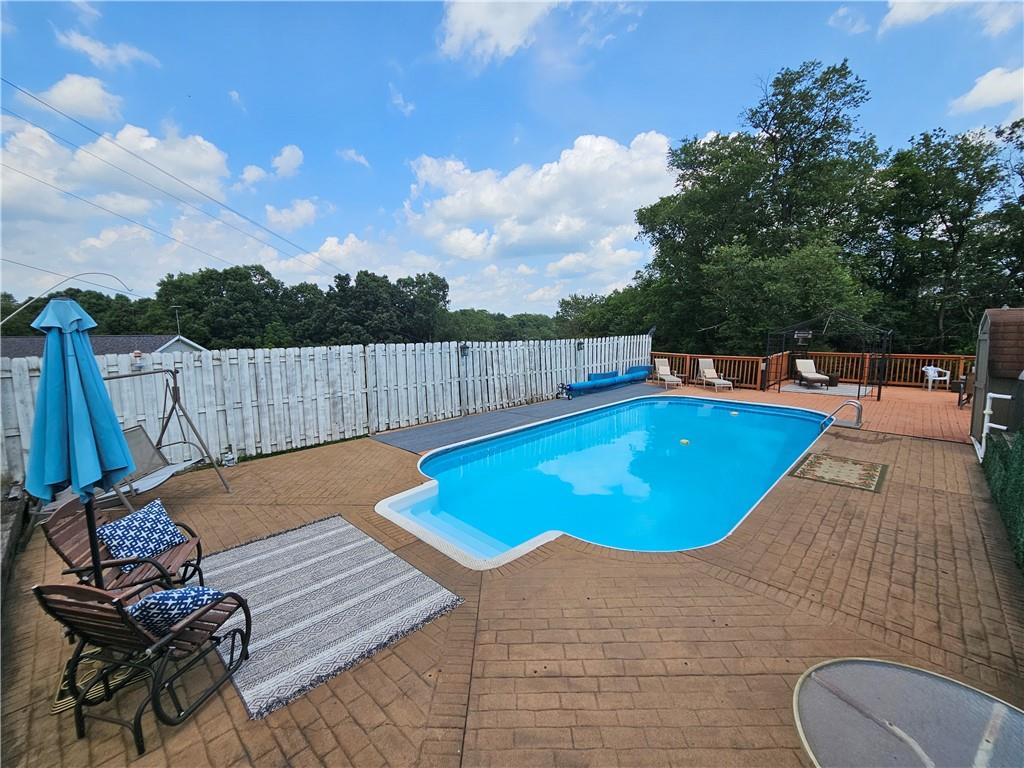 323 Hoon Road Butler, PA 16001 - Photo 2 of 49 a view of a swimming pool with a lounge chair