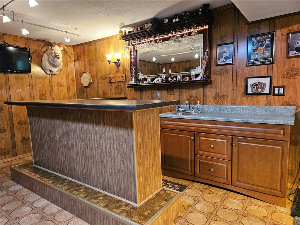 323 Hoon Road Butler, PA 16001 - Photo 24 of 49 a bathroom with a sink a mirror and a shower