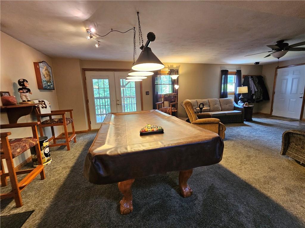 323 Hoon Road Butler, PA 16001 - Photo 25 of 49 a living room with furniture pool table and a large window
