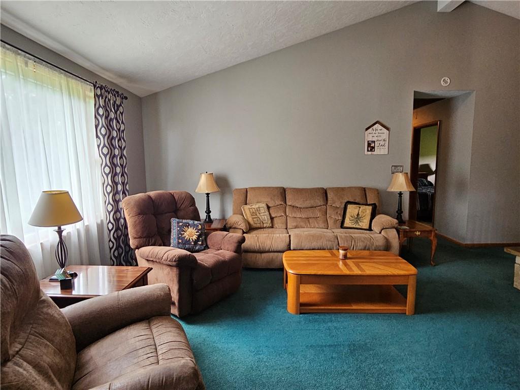 323 Hoon Road Butler, PA 16001 - Photo 26 of 49 a living room with furniture and a couch