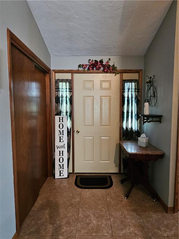 323 Hoon Road Butler, PA 16001 - Photo 27 of 49 a living room with furniture and flowers