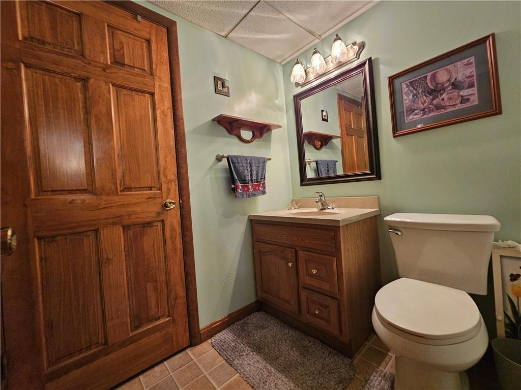 323 Hoon Road Butler, PA 16001 - Photo 30 of 49 a bathroom with a toilet sink and mirror