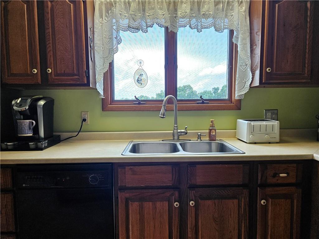 323 Hoon Road Butler, PA 16001 - Photo 31 of 49 a kitchen with a sink and a window