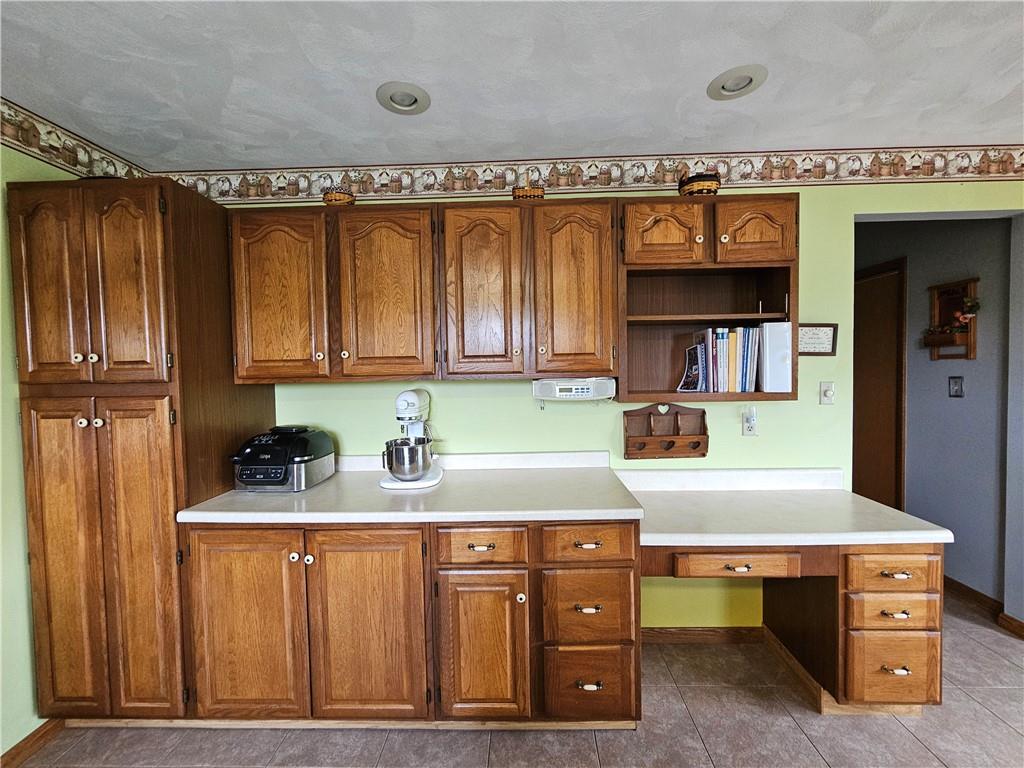 323 Hoon Road Butler, PA 16001 - Photo 35 of 49 a kitchen with stainless steel appliances granite countertop a sink and cabinets