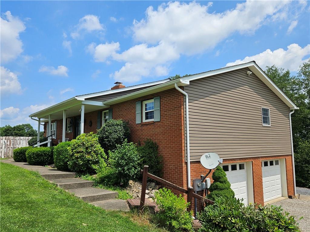 323 Hoon Road Butler, PA 16001 - Photo 41 of 49 a front view of a house with a yard