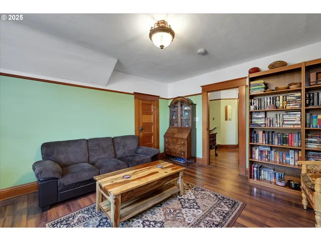 a view of walk in closet with clothes