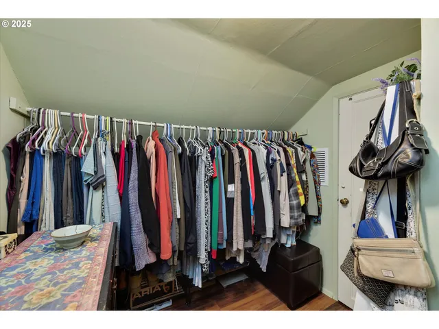 a bedroom with a bed and a cabinets