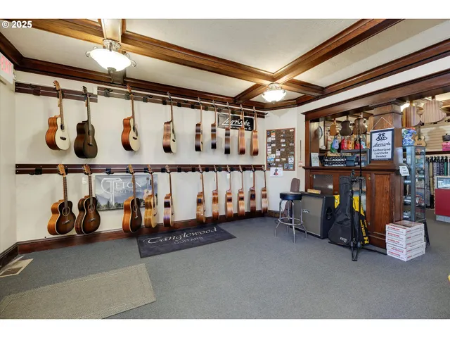 a view of a room with lots of furniture