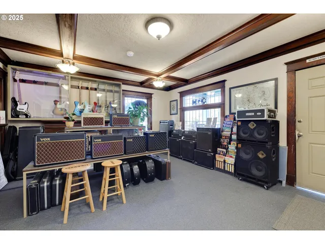 a kitchen with stainless steel appliances granite countertop a stove and cabinets