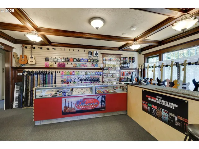 a living room with lots of furniture and a flat screen tv