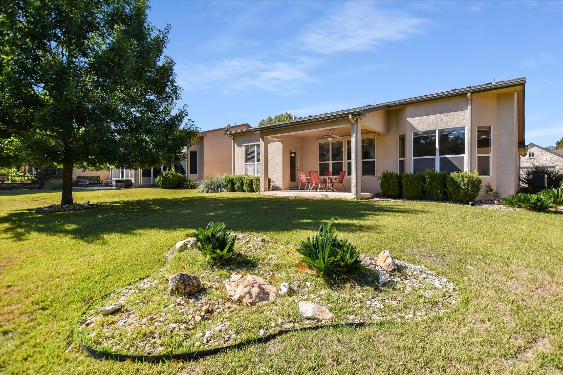 117 Beautybush Trail Georgetown, TX 78633 - Photo 25 of 25 a front view of a house with a yard table and seating