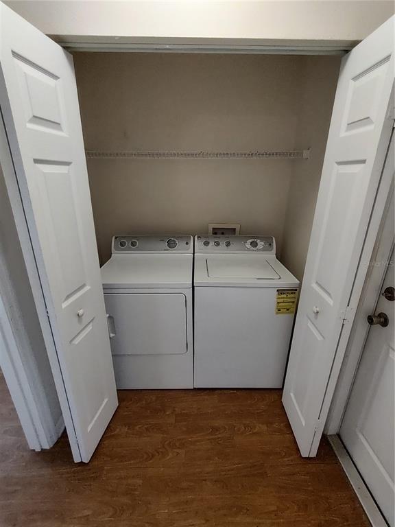 7688 Southwest 77 Place Ocala, FL 34476 - Photo 14 of 16 a utility room with dryer and washer