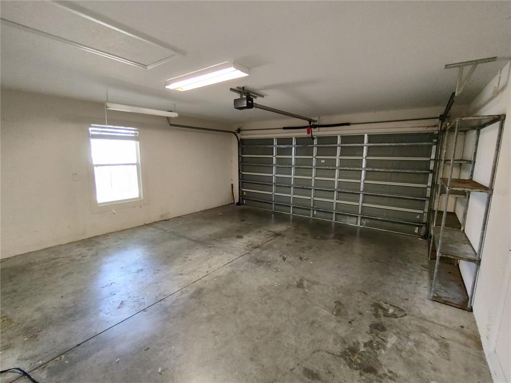 7688 Southwest 77 Place Ocala, FL 34476 - Photo 15 of 16 a view of an empty room with a staircase