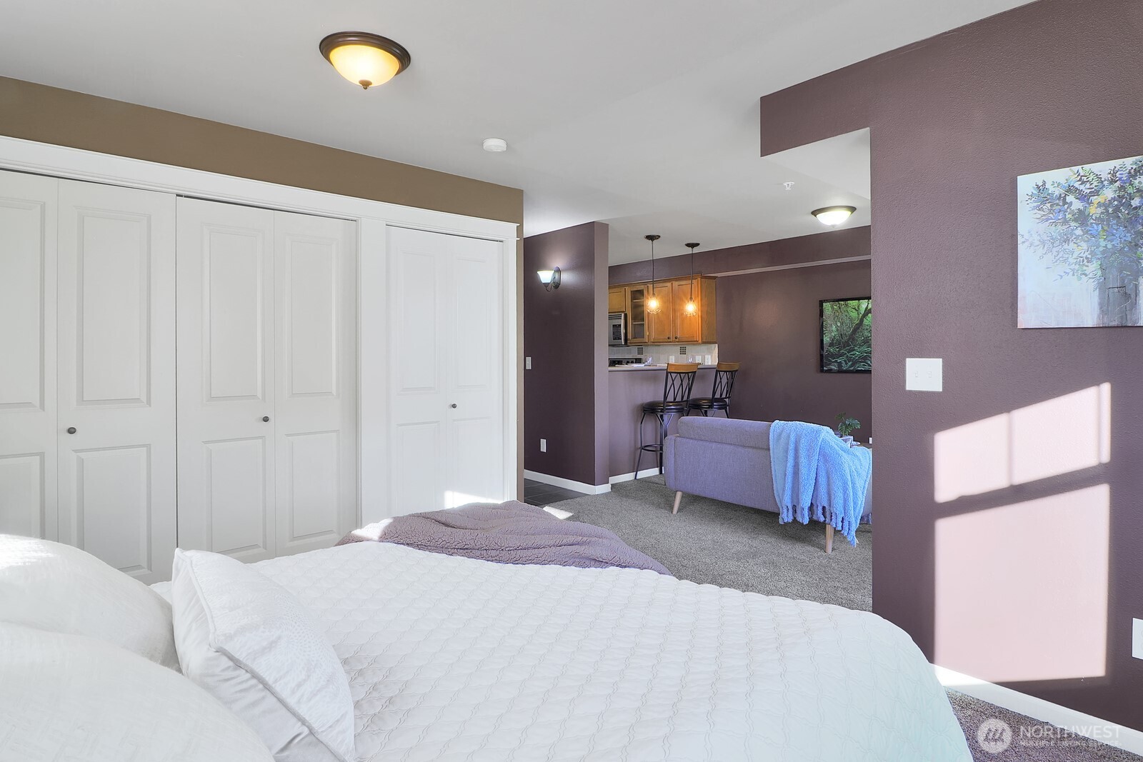 690 32nd Street, Unit B211 Bellingham, WA 98225 - Photo 13 of 23 a bedroom with a bed and a couch