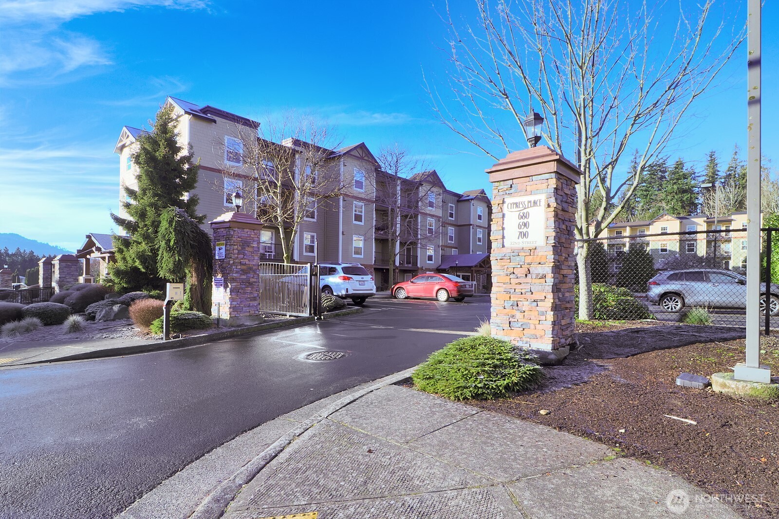 690 32nd Street, Unit B211 Bellingham, WA 98225 - Photo 20 of 23 a city street lined with tall buildings