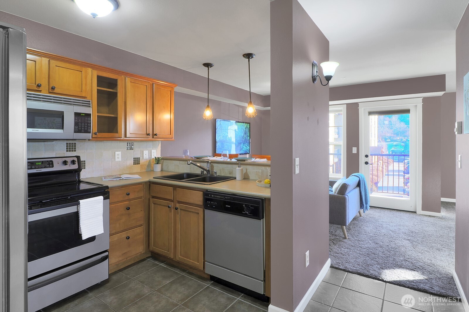 690 32nd Street, Unit B211 Bellingham, WA 98225 - Photo 2 of 23 a kitchen with a sink stove and cabinets