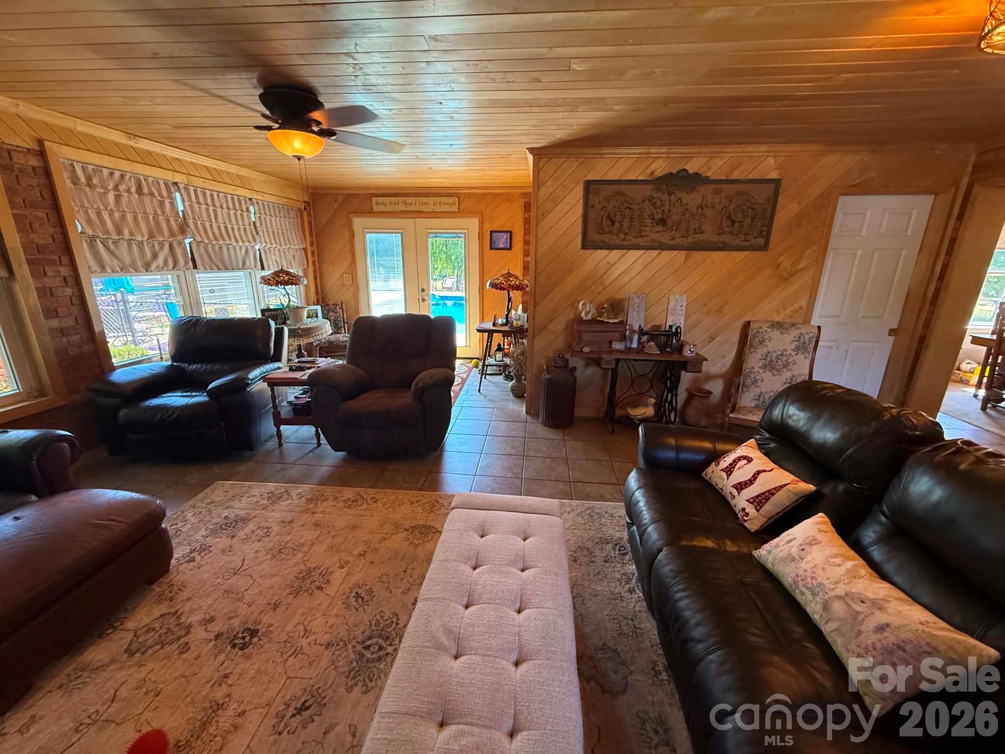 2121 Union Grove Road Lenoir, NC 28645 - Photo 25 of 38 a living room with furniture and a flat screen tv
